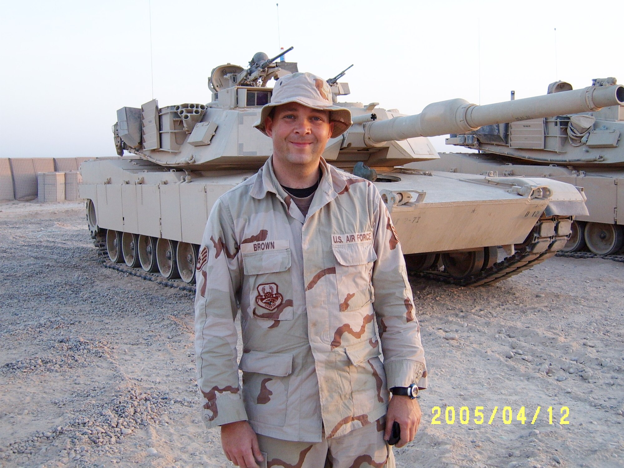 Staff Sgt. William Brown poses for a photo at a U.S. Army post while deployed in support of Operation Iraqi Freedom, April 4, 2005. Brown was assigned to U.S. Army’s 917th Corps Support Group, 1058th Gun Truck Detachment as gun truck commander of gun truck security. Brown was deployed from the 188th Logistics Readiness Squadron, Fort Smith, Ark., and is a native of Conway, Ark. (Courtesy photo)