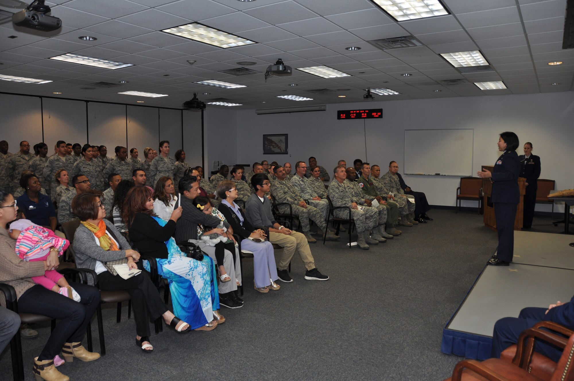 NAVAL AIR STATION FORT WORTH JOINT RESERVE BASE, Texas - New 301st Force Support Squadron Commander Maj. Myla Abejuela addresses the crowd Nov. 7, 2015, at her assumption of command here. Prior to assuming command, Abejuela served as the wing executive officer at the 920th Wing, Nellis Air Force Base, Nev. (U.S. Air Force photo/Senior Airman Jeromie Cano)