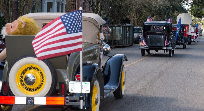 Some vintage automobiles drive in the Veterans Day Parade in downtown Charleston, S.C., on Nov. 7, 2015. Veterans, volunteers, active duty military, military supporting organizations, Junior Reserve Officer Training Corps units and the North Charleston High School marching band also were in attendance. (U.S. Air Force photo/Airman 1st Class Thomas T. Charlton)