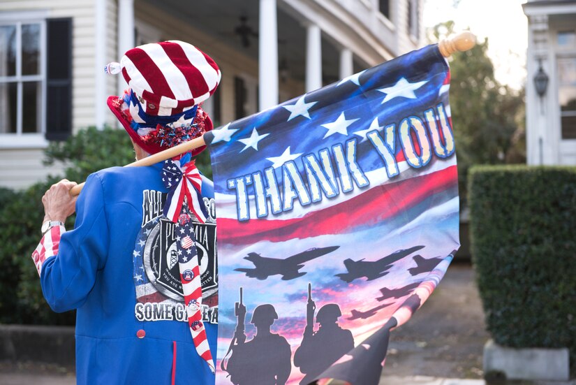 A patriot strolls through downtown Charleston, S.C., Nov. 7, 2015 as part of the Veteran’s Day Parade. Veterans, volunteers, active duty military, military supporting organizations, Junior Reserve Officer Training Corps units and the North Charleston High School marching band also were in attendance. (U.S. Air Force photo/Airman 1st Class Thomas T. Charlton)