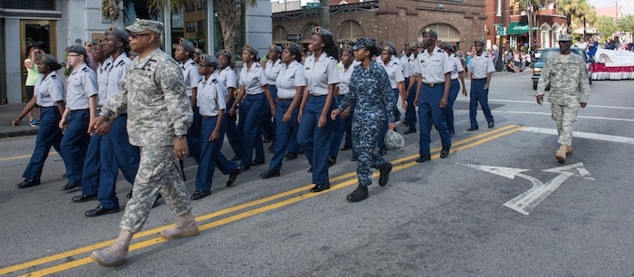 The Garrett Academy Junior Reserve Officer Training Corps unit march through downtown Charleston, S.C., during the Veteran’s Day Parade on Nov. 7, 2015. In addition to this JROTC unit, active duty military, veterans, military supporting organizations, volunteers, other JROTC units and the North Charleston High School marching band also were in attendance. (U.S. Air Force photo/Airman 1st Class Thomas T. Charlton)