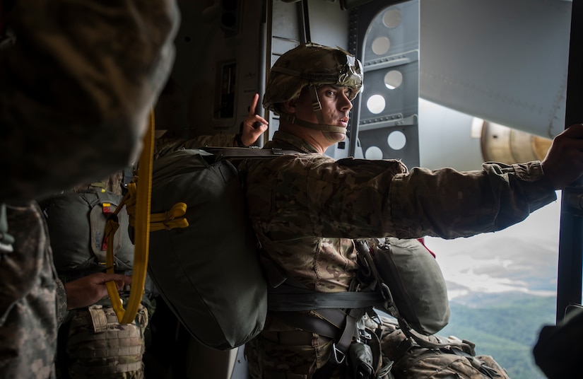 A Soldier with the 82nd Airborne Division waits for the time to jump during exercise Ultimate Reach Nov. 4, 2015, while flying over Europe. Ultimate Reach is an annual U.S. Transportation Command-sponsored live-fly exercise designed to exercise the ability of the 18th Air Force to plan and conduct strategic airdrop missions. This iteration of Ultimate Reach partnered with NATO Exercise Trident Juncture being held in locations across Europe. (U.S. Air Force photo/Airman 1st Class Clayton Cupit)