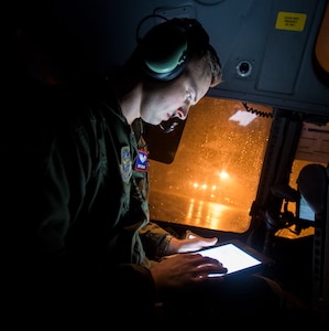 Capt. Christopher Mahan, 15th Airlift Squadron pilot, makes preflight checks during Exercise Ultimate Reach 16, Nov. 4, 2015, on the flightline at Pope Army Airfield, N.C. Ultimate Reach is an annual U.S. Transportation Command-sponsored live-fly exercise designed to exercise the ability of the 18th Air Force to plan and conduct strategic airdrop missions. This iteration of Ultimate Reach partnered with the NATO Exercise Trident Juncture being held in locations across Europe. (U.S. Air Force photo/Airman 1st Class Clayton Cupit)