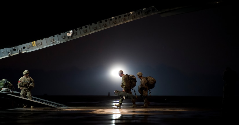 Soldiers from the 82nd Airborne Division board a C-17 Globemaster III during Exercise Ultimate Reach 16, Nov. 4, 2015, on the flightline at Pope Army Airfield, N.C. Ultimate Reach is an annual U.S. Transportation Command-sponsored live-fly exercise designed to exercise the ability of the 18th Air Force to plan and conduct strategic airdrop missions. This iteration of Ultimate Reach partnered with NATO Exercise Trident Juncture, held in various locations across Europe. (U.S. Air Force photo/Airman 1st Class Clayton Cupit)