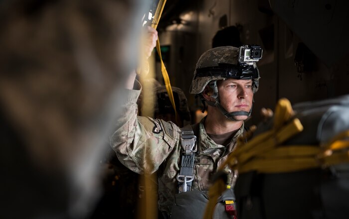 U.S. Army Col. Joseph Ryan, 82nd Airborne Division, 2nd Brigade Combat Team commander, awaits the green light to jump during Exercise Ultimate Reach 16, Nov. 4, 2015, while flying over Spain. Ultimate Reach is an annual U.S. Transportation Command-sponsored live-fly exercise designed to exercise the ability of the 18th Air Force to plan and conduct strategic airdrop missions. This iteration of Ultimate Reach partnered with the NATO Exercise Trident Juncture being held in locations across Europe. (U.S. Air Force photo/Airman 1st Class Clayton Cupit)