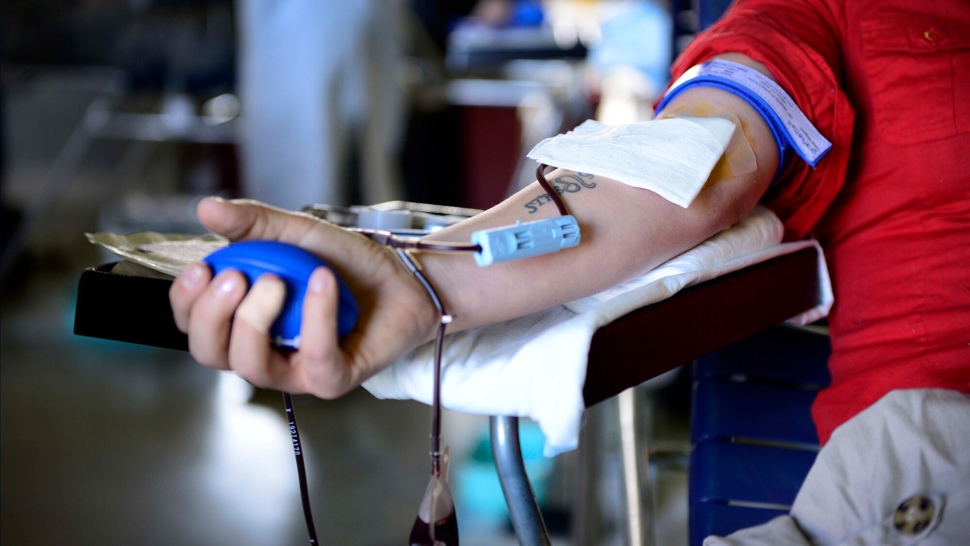 U.S. Air Force Senior Airman Kimberly Gray, 31st Security Forces Squadron investigator, gives blood during the Armed Services Blood Program blood drive, Nov. 9, 2015, at Aviano Air Base, Italy. The ASBP collects, processes, stores, distributes, and transfuses blood worldwide. (U.S. Air Force photo by Senior Airman Areca T. Bell/Released)