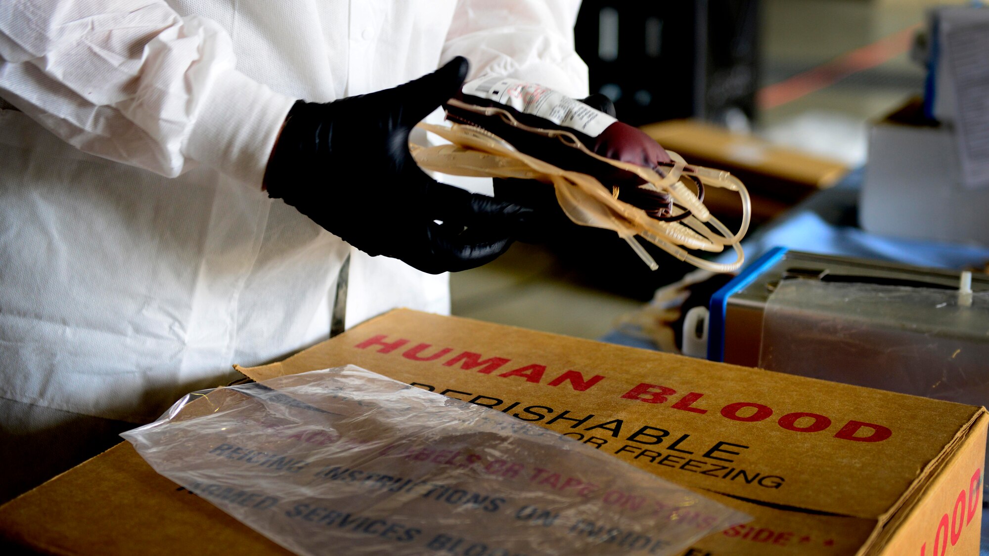 A U.S. Army Soldier prepares blood for processing and shipment during the Armed Services Blood Program blood drive, Nov. 9, 2015, at Aviano Air Base, Italy. The ASBP collects, processes, stores, distributes, and transfuses blood worldwide. (U.S. Air Force photo by Senior Airman Areca T. Bell/Released)