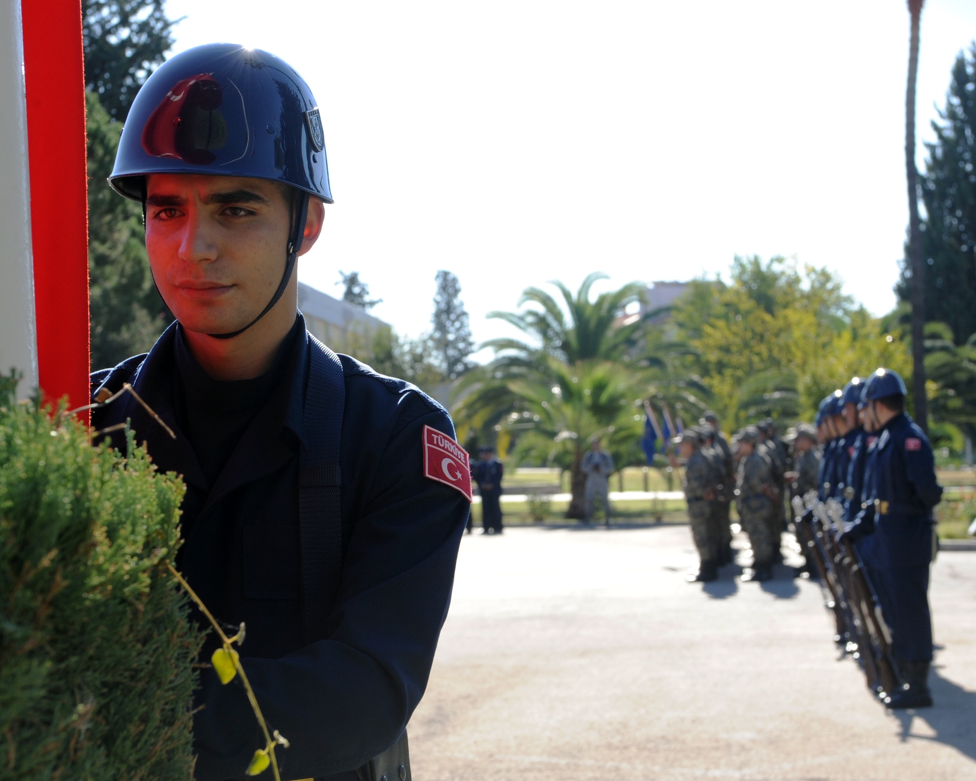 A Turkish service member prepares to raise the Turkish flag during a memorial ceremony honoring Mustafa Kemal Ataturk’s life Nov. 10, 2015, at Incirlik Air Base, Turkey. Ataturk formed the modern Republic of Turkey on October 29, 1923, and became the first president earning the title ‘Father of Turkey’. (U.S. Air Force photos by Airman 1st Class Daniel Lile/Released)