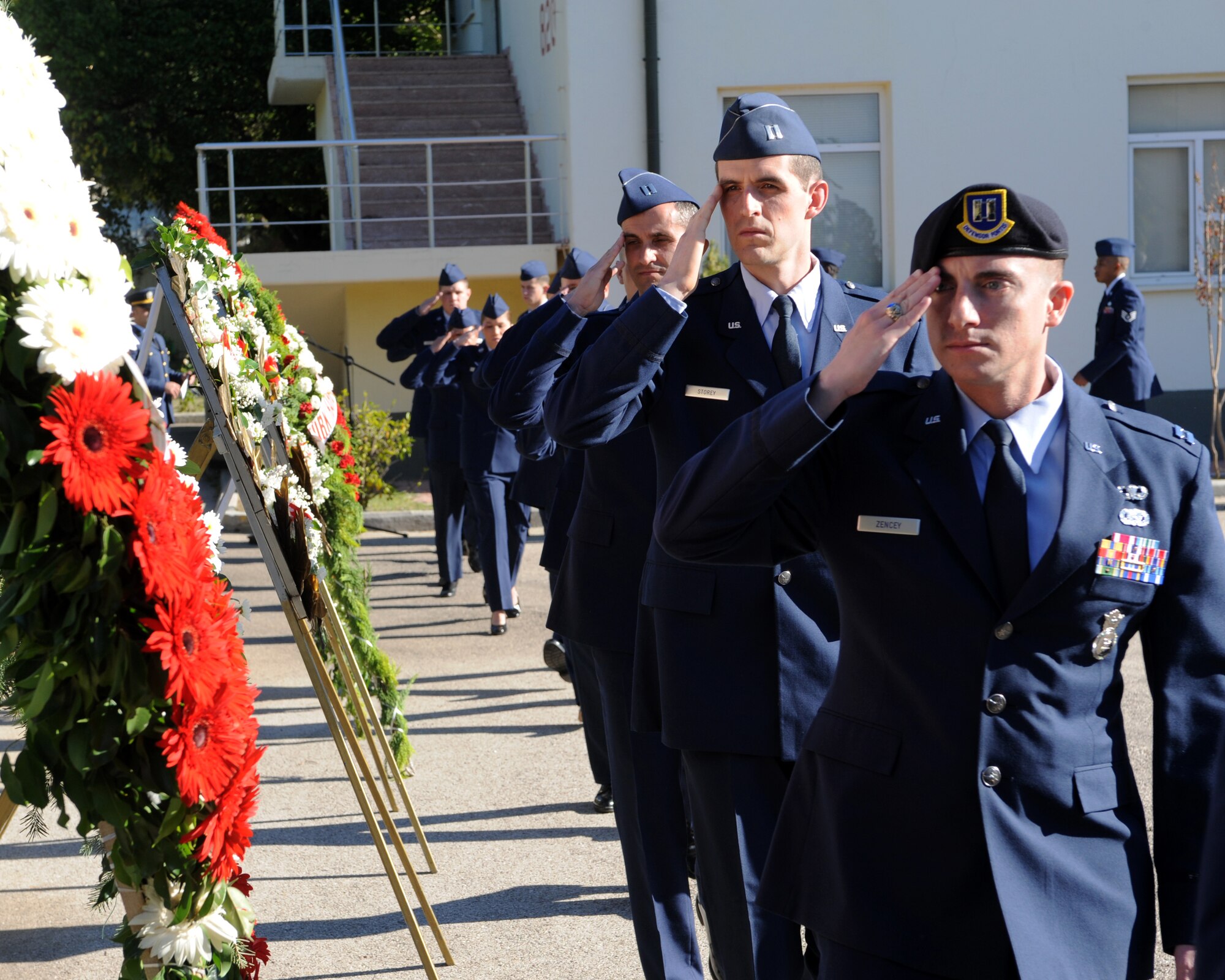 U.S. Air Force service members salute while passing a Mustafa Kemal Ataturk statue Nov. 10, 2015, at Incirlik Air Base. U.S. and Turkish service members partnered together to honor and pay respect to Ataturk during the ceremony. (U.S. Air Force photo by Airman 1st Class Daniel Lile/Released)