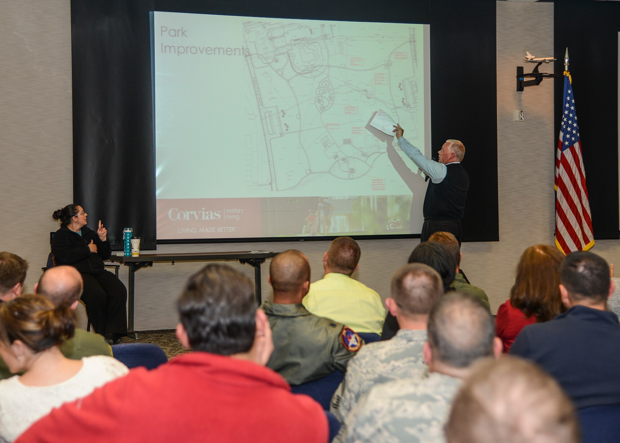 Josh Crawford, Corvias business director show a map of the new Community Park on Fitz-Gerald Blvd. that is slated to open in April of 2016. (U.S. Air Force photo by Rebecca Amber)