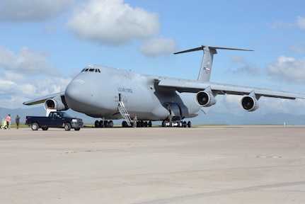 A U.S. Air Force C-5 Galaxy, 68th airlift squadron, 433rd operations group, delivers 23,415 pounds in humanitarian aid supplies to Soto Cano Air Base, Honduras, Nov. 9, 2015. The delivery was made possible due to the Denton Program which allows the use of extra space on U.S. military cargo aircraft to transport humanitarian assistance materials donated by non-government organizations, international organizations, and private voluntary organizations for humanitarian relief. (U.S. Air Force photo by Senior Airman Westin Warburton/Released) 