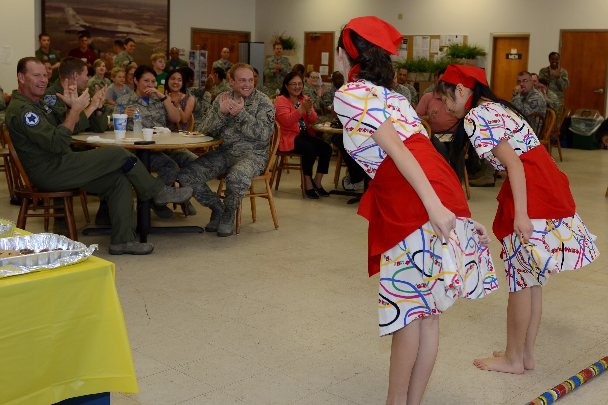 The teen and youth dance troop from the Filipino-American Association of Greater Columbia demonstrates the Filipino-originated Tinikling Dance during “A Taste of McEntire” diversity day celebration at McEntire Joint National Guard Base, S.C., Nov. 7, 2015. Diversity Day combines the Department of Defense's monthly diversity programs into a one day event for guardsmen to learn about other cultures and to celebrate diversity. (U.S. Air National Guard photo by Airman 1st Class Ashleigh Pavelek/RELEASED)