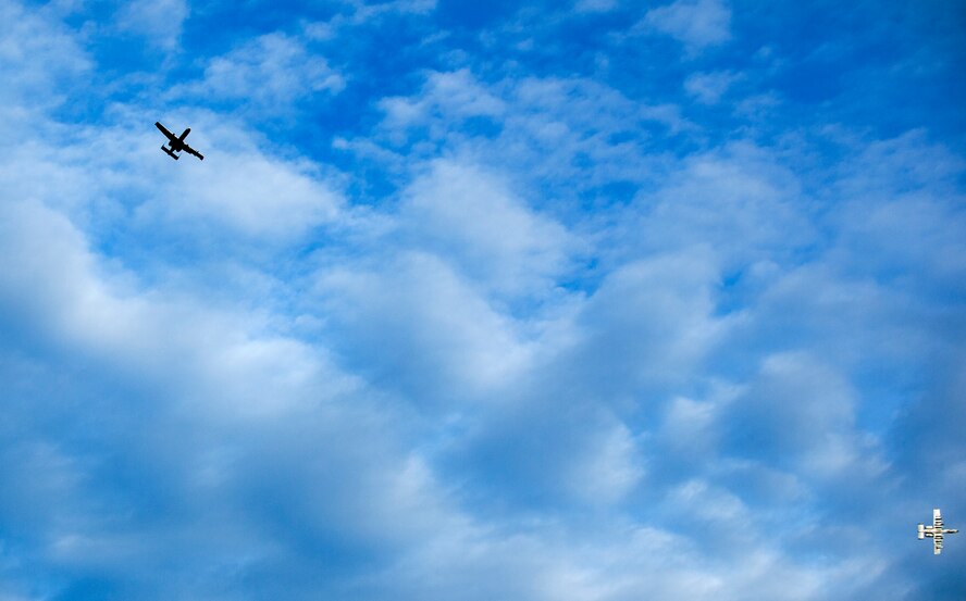 U.S. Air Force A-10 Thunderbolt II attack aircraft, assigned to the 74th Expeditionary Fighter Squadron, fly over Spangdahlem Air Base, Germany, Nov. 9, 2015. Approximately 350 Airmen and support equipment from the 23rd Wing at Moody Air Force Base, Ga., conducted routine flying training and participated in several exercises and training events with NATO allies to strengthen interoperability and demonstrate U.S. commitment to the security and stability of Europe. (U.S. Air Force photo Senior Airman Rusty Frank/Released)