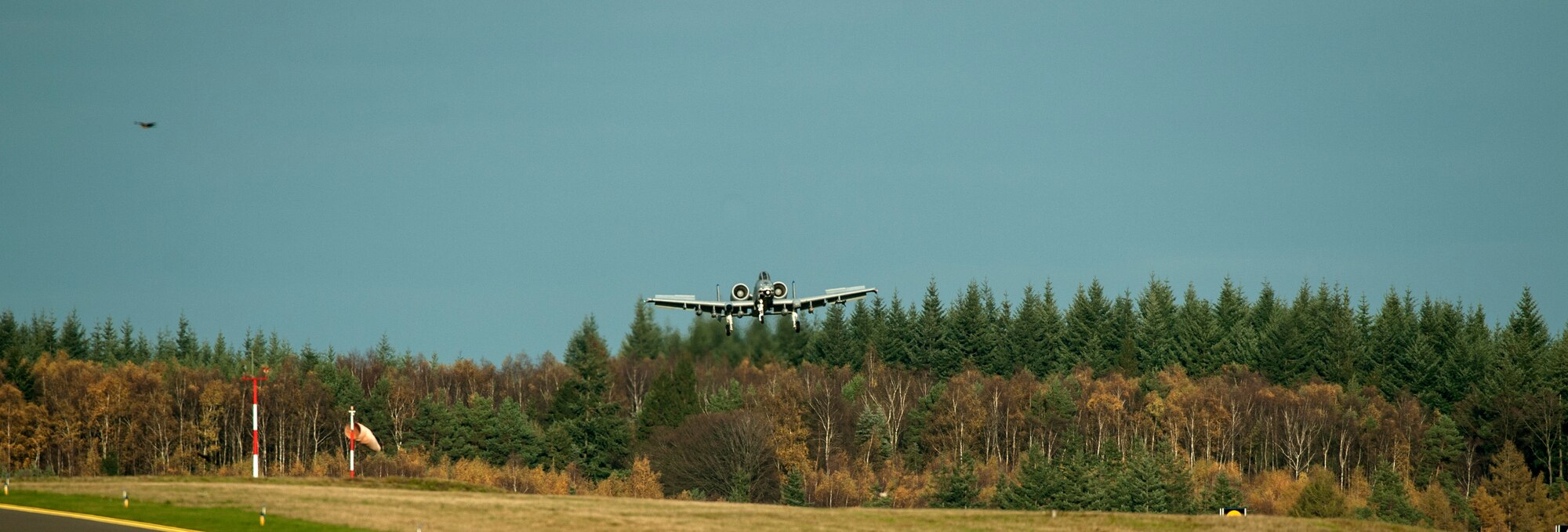 A U.S. Air Force A-10 Thunderbolt II attack aircraft, assigned to the 74th Expeditionary Fighter Squadron lands at Spangdahlem Air Base, Germany, Nov. 9, 2015. The aircraft forward deployed to locations in Eastern Europe and work alongside NATO allies as part of a theater security package in support of Operation Atlantic Resolve. (U.S. Air Force photo by Senior Airman Rusty Frank/Released)