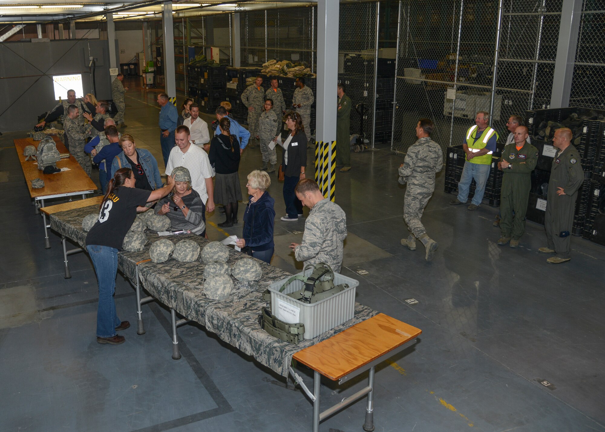 Honorary commanders geared up for a simulated 179-day deployment to “Deployedistan” in a fast-paced deployment processing orientation tour Nov. 6. (U.S. Air Force photo by Rebecca Amber)