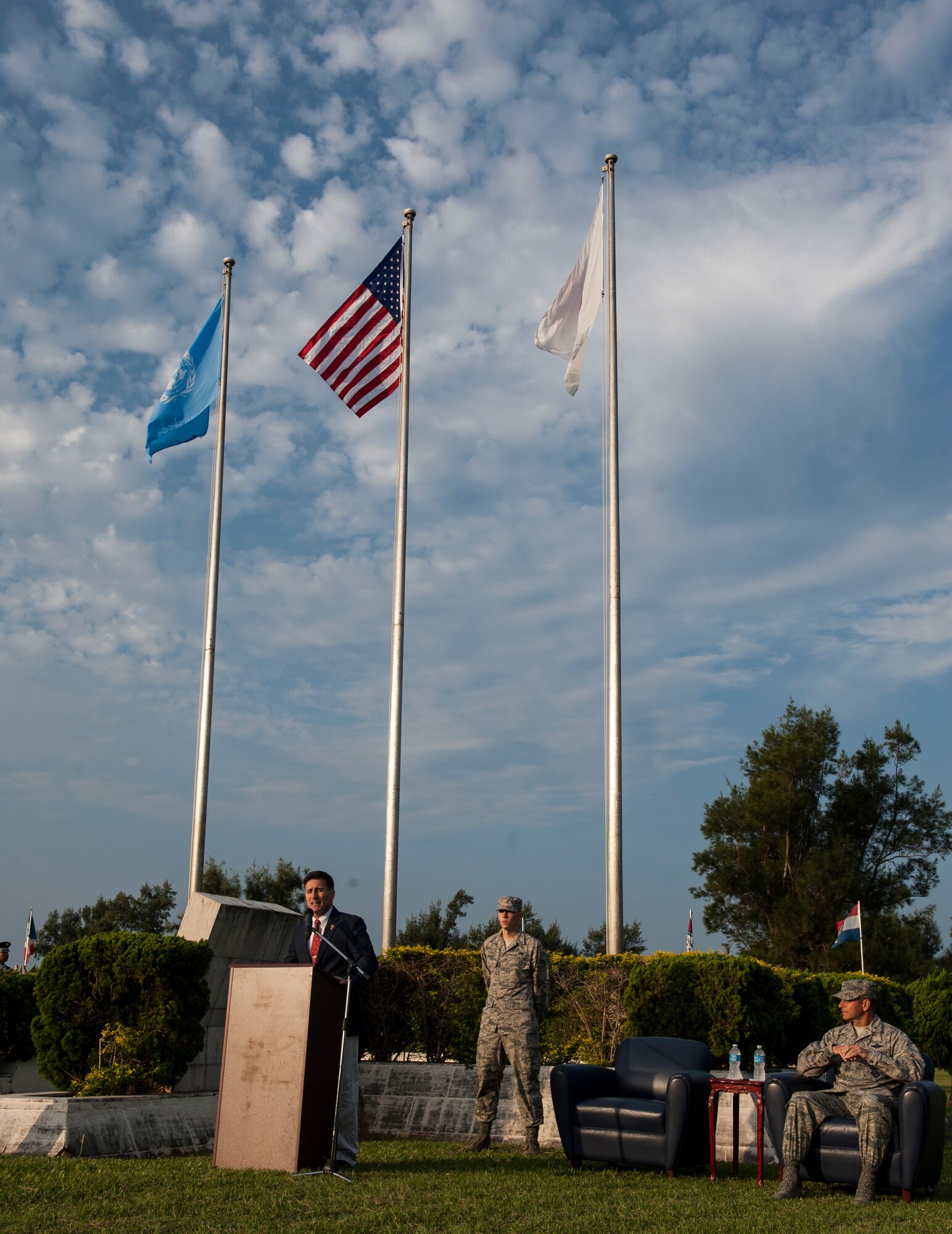 Brent Cook, retired U.S. Marine Corps sergeant major and Kadena USO center manager, speaks during a Veterans Day ceremony Nov. 11, 2015, at Kadena Air Base, Japan. Cook spoke about the significance of being a veteran and the sacrifices they make to ensure Americans' freedoms. (U.S. Air Force photo by Airman 1st Class Lynette M. Rolen)