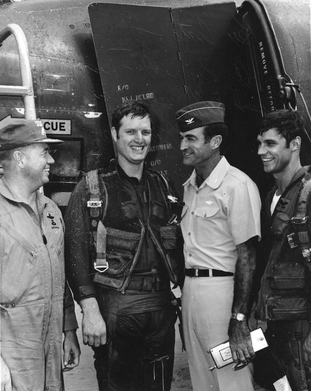 Pictured here with Sgt Ken Coats are three of the famous leaders of the 432nd Tactical Fighter Wing at Udorn RTAFB, circa 1970 after Coats received an incentive flight.  From left to right are Lt Col Joseph W. Kittinger II (later Col, also a POW), Commander of the 555th TFS, Wing Commander Col Charles Gabriel (later General and Chief of Staff of the Air Force) Sgt. Ken Coats and the squadron’s Weapons Officer Capt (later Lt Gen) Richard T. Swope.  (Courtesy Ken Coats)