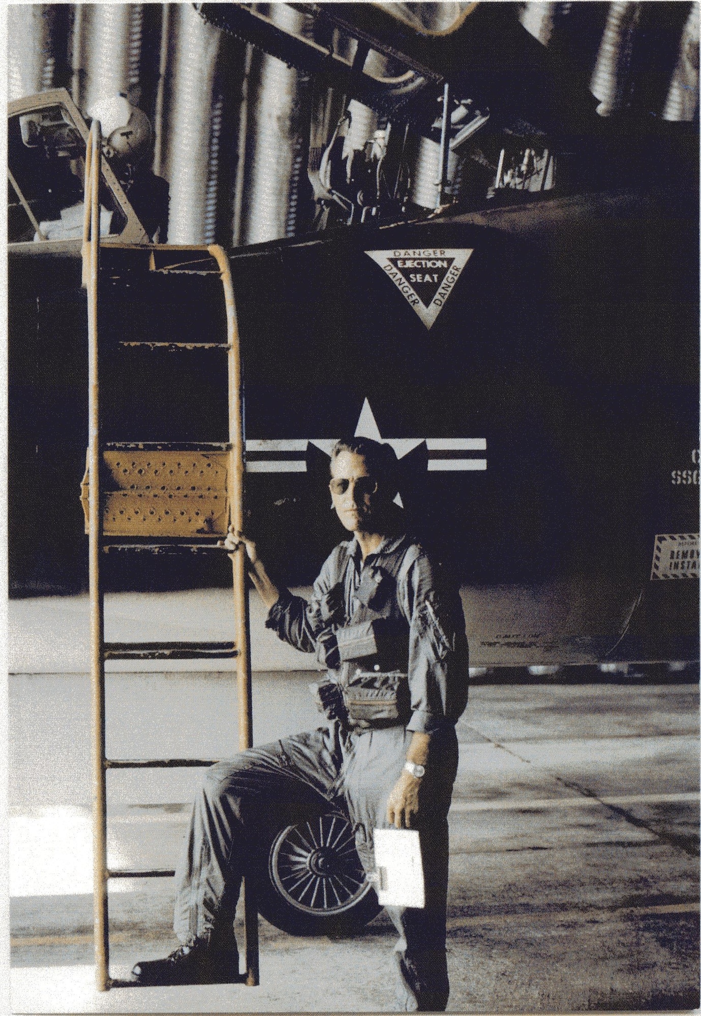 William B. McDonald served on two overseas Palace Alert tours in F-102 units in West Germany and in Southeast Asia.  He is pictured here overseas in a hardened aircraft shelter about to climb into an F-102 Delta Dagger fighter-interceptor.  (Courtesy 142FW History Archives)