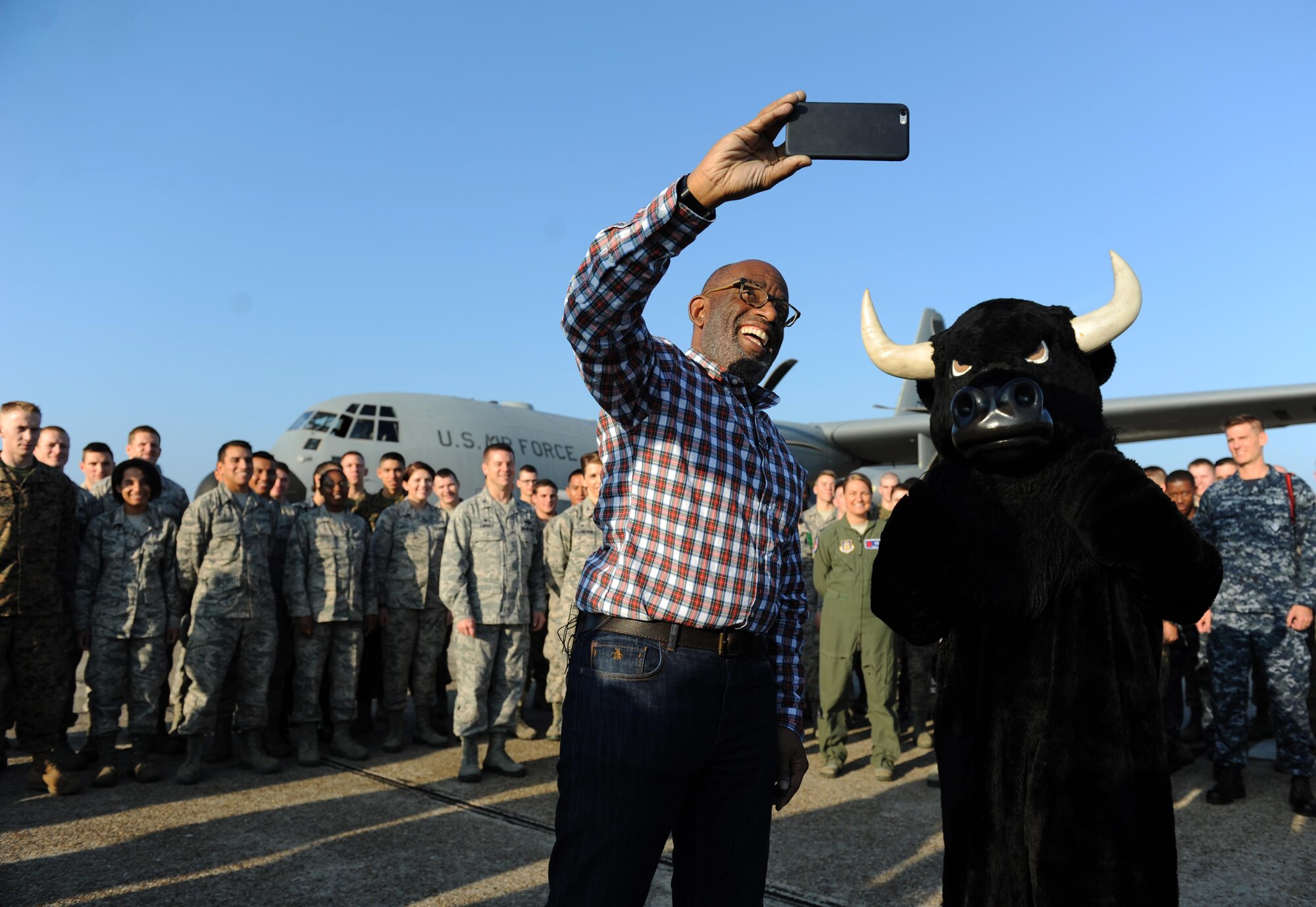 Al Roker, TODAY Show weather anchor, takes a selfie with the 335th Training Squadron mascot, 81st Training Wing leadership and Airmen from the 81st Training Group following Roker’s weather report during a segment of the TODAY Show on the flight line at Keesler Air Force Base, Miss. Nov. 11, 2015. Keesler was one stop during the show’s Rokerthon 2 as Roker attempts a world record by reporting national and local weather from all 50 states. (U.S. Air Force photo by Kemberly Groue)