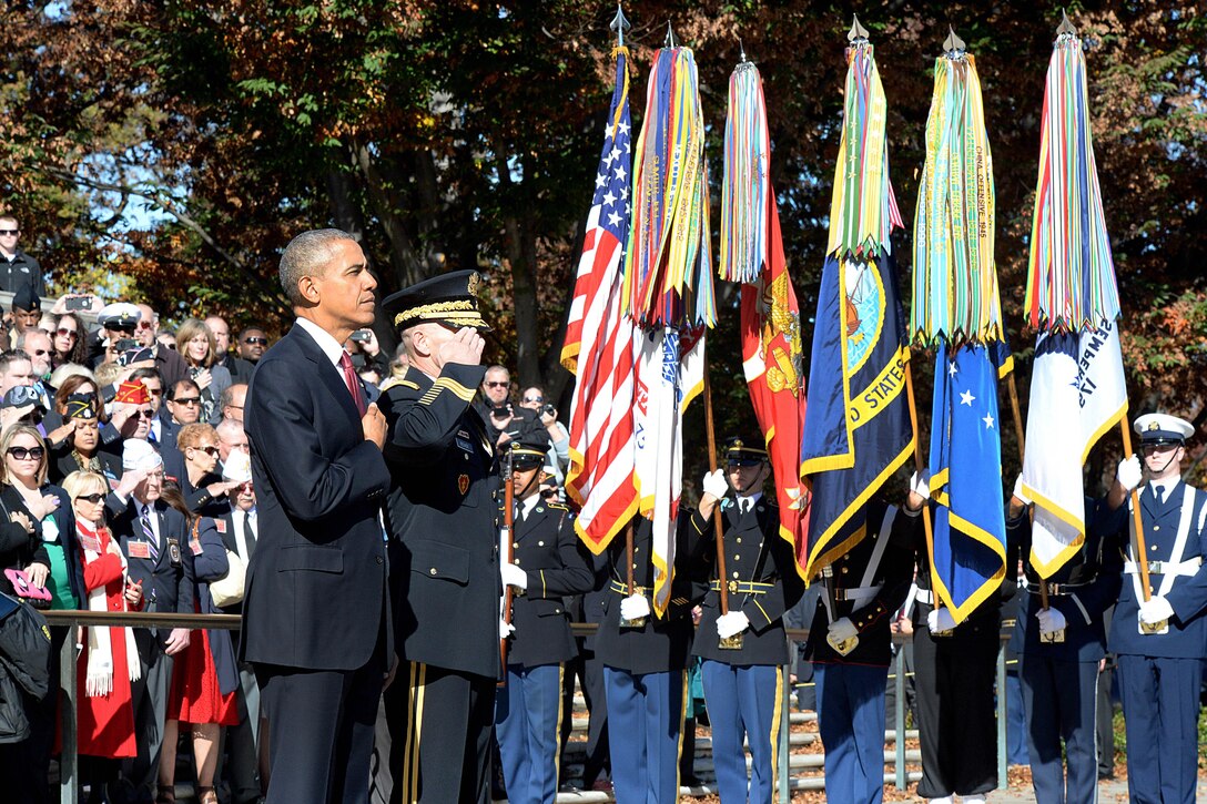 President Barack Obama puts his hand over his heart during the 62nd annual national Veterans Day observance before a ceremony at the Tomb of the Unknown Soldier in Arlington National Cemetery in Arlington, Va., Nov. 11, 2015. DoD photo by Army Sgt. 1st Class Clydell Kinchen