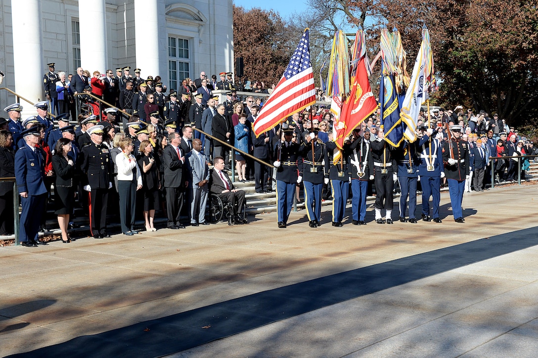 Defense Secretary Ash Carter renders honor during the passing of the colors at the 62nd annual national Veterans Day observance at Arlington National Cemetery in Arlington, Va., Nov. 11, 2015. DoD photo by Army Sgt. 1st Class Clydell Kinchen