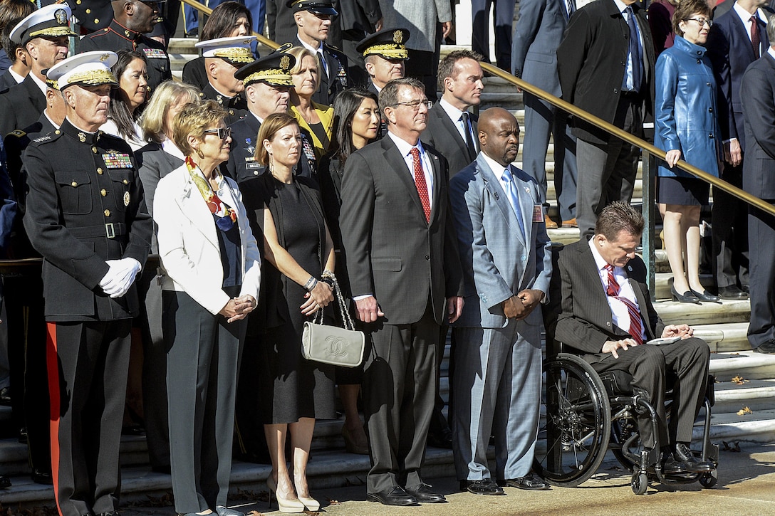 Defense Secretary Ash Carter and his wife, Stephanie, attend the 62nd annual national Veterans Day observance at Arlington National Cemetery in Arlington, Va., Nov. 11, 2015. DoD photo by Army Sgt. 1st Class Clydell Kinchen


