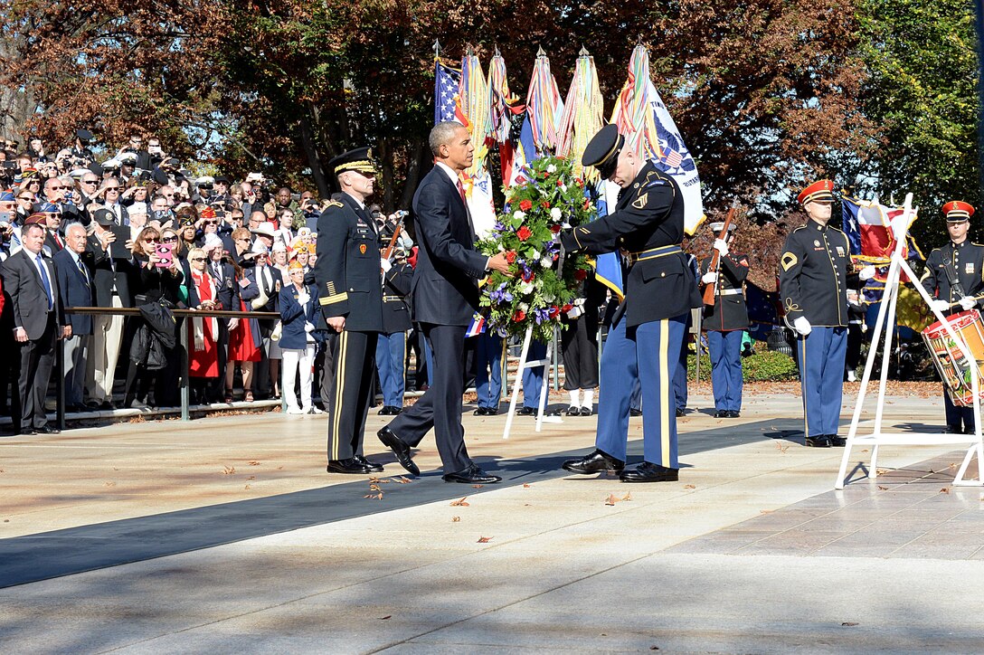 President Barack Obama lays a wreath during the 62nd annual national Veterans Day observance at Arlington National Cemetery in Arlington, Va., Nov. 11, 2015. DoD photo by Army Sgt. 1st Class Clydell Kinchen