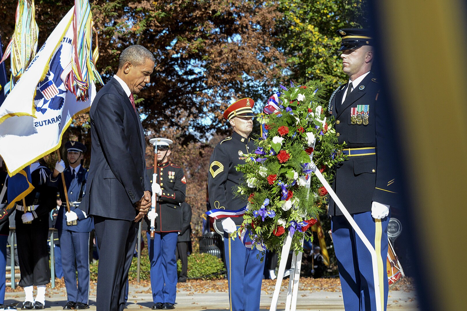 President Barack Obama bows his head at the 62nd annual national Veterans Day observance at Arlington National Cemetery in Arlington, Va., Nov. 11, 2015. DoD photo by Army Sgt. 1st Class Clydell Kinchen

