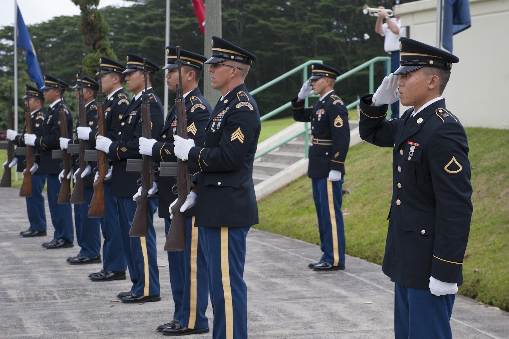 Honor Guard members of the Hawaii Air National Guard perform a rifle salute during the 2015 Governor’s Veterans Day Ceremony at the Hawaii State Veterans Cemetery Nov. 11, in Kaneohe, Hawaii. U.S. Army Maj. Gen. Arthur J. Logan, the adjutant general of the state of Hawaii, and Shan Tsutsui, lieutenant governor of Hawaii, provided welcoming remarks and a keynote speech during the ceremony. (U.S. Air Force photo by Staff Sgt. Christopher Hubenthal)
