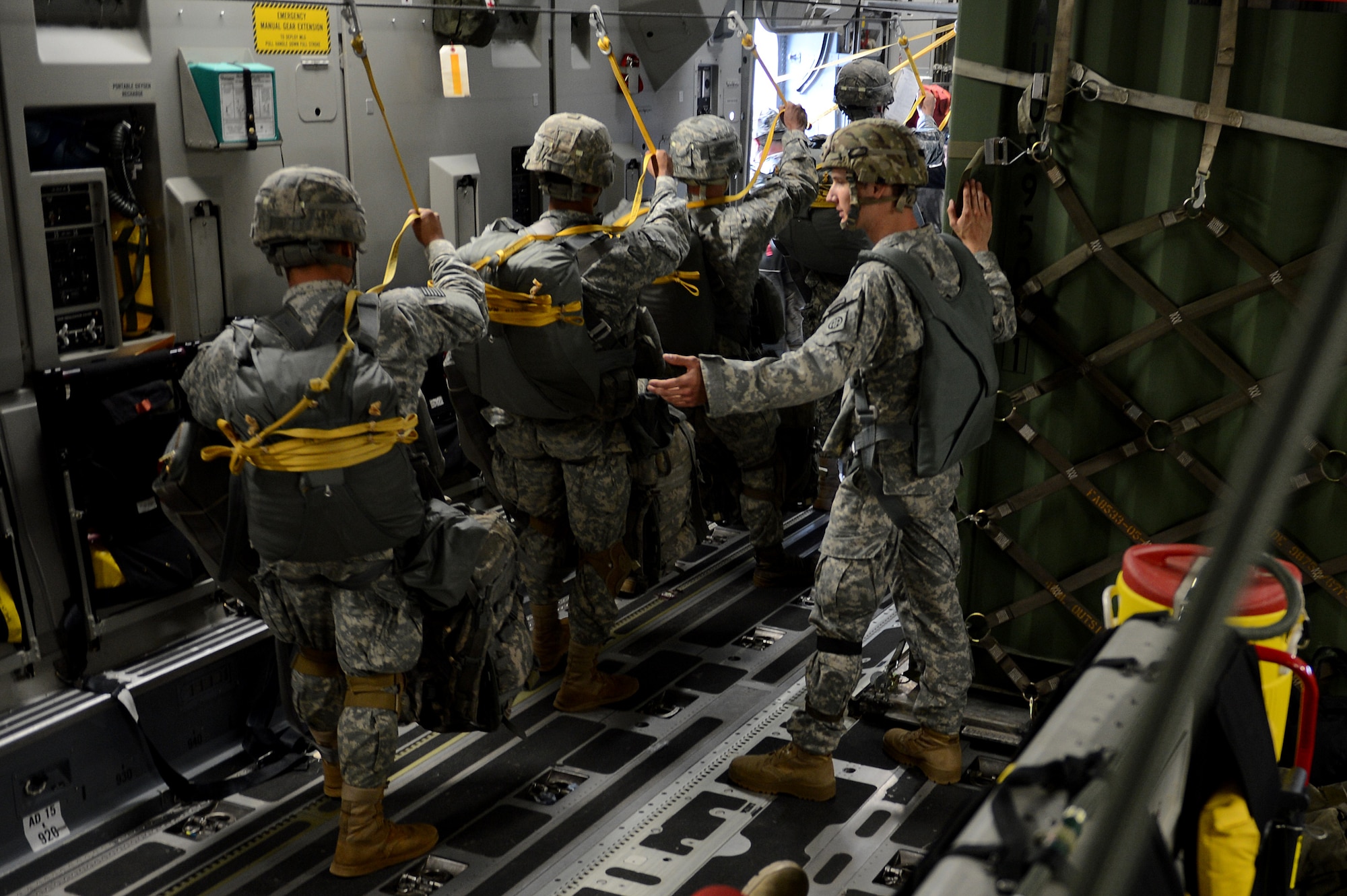 Soldiers from the 82nd Airborne Division jump out of a C-17 Globemaster III Nov. 4, 2015, over Casa de Campos, Spain during exercise Ultimate Reach. Trident Juncture/Ultimate Reach was the largest NATO exercise conducted in the last 20 years and demonstrated the collective capabilities of the alliance to deter aggression. (U.S. Air Force photo/Senior Airman Divine Cox)