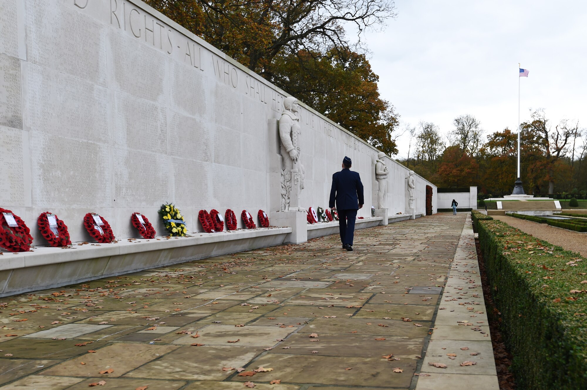 U.S. Air Force Lt. Gen. Timothy Ray, 3rd Air Force and 17th Expeditionary Air Force commander, walks alongside the Tablets of the Missing following a Veterans Day ceremony at Cambridge American Cemetery, United Kingdom, Nov. 11, 2015. The Tablets of the Missing is a stone wall engraved with the names of 5,127 Americans who were declared missing in action during World War II. (U.S. Air Force photo by Staff Sgt. Jarad A. Denton/Released)