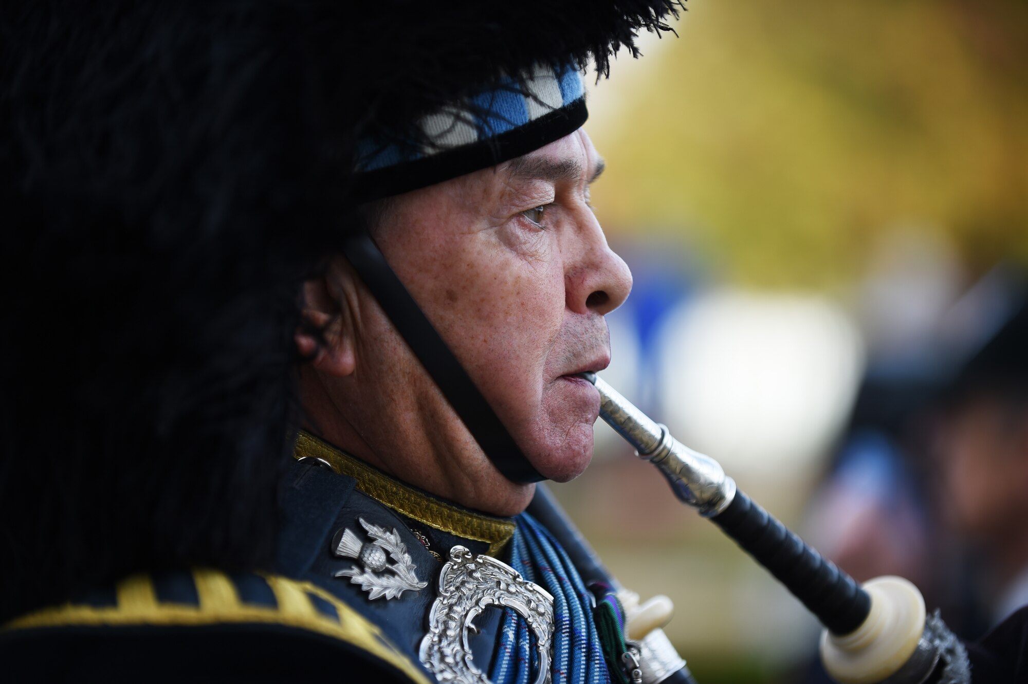 Royal Air Force Warrant Officer, retired, Gary Kernaghan plays a bagpipe during a Veterans Day ceremony at Cambridge American Cemetery, United Kingdom, Nov. 11, 2015. Since 1919, the United States has set aside the 11th day of November to remember the sacrifices of veterans both past and present. (U.S. Air Force photo by Staff Sgt. Jarad A. Denton/Released)