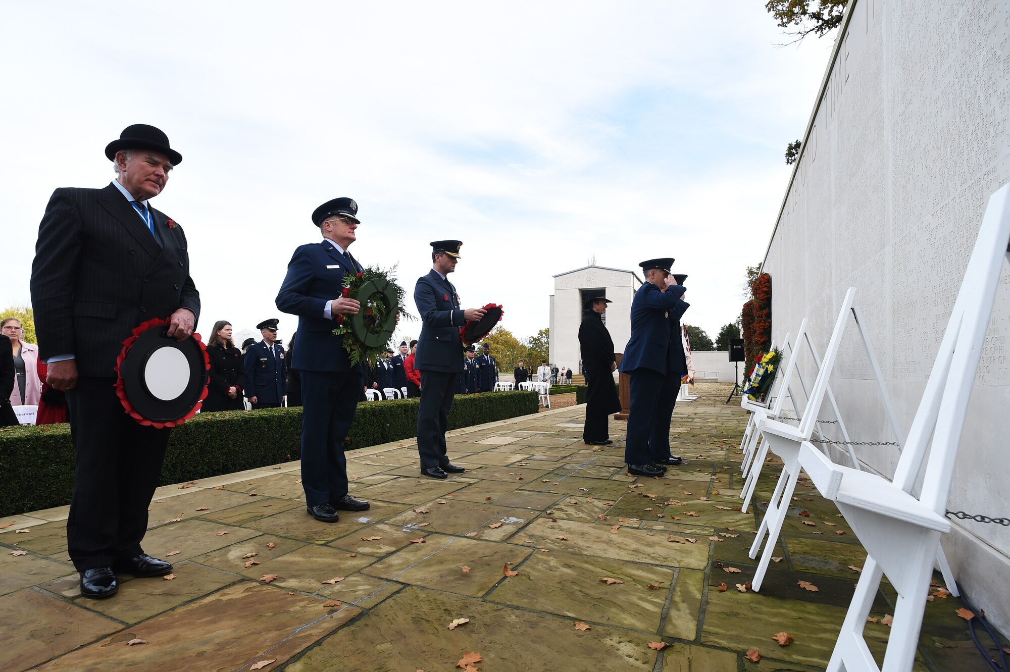 U.S. Air Force Lt. Gen. Timothy Ray, 3rd Air Force and 17th Expeditionary Air Force commander, and Col. Kevin Cullen, 501st Combat Support Wing commander, render a ceremonial salute during a Veterans Day ceremony at Cambridge American Cemetery, United Kingdom, Nov. 11, 2015. Ray and Cullen laid a wreath on behalf of the men and women of the 501st CSW in honor of the sacrifices made by past Service members. (U.S. Air Force photo by Staff Sgt. Jarad A. Denton/Released)