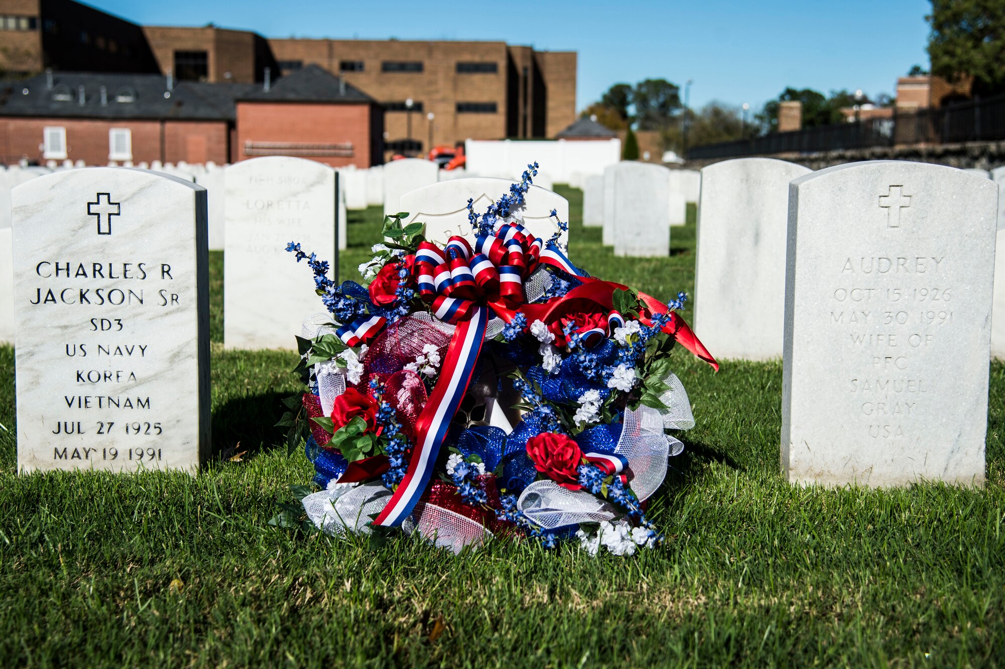 A wreath lies on the grave of Civil War medal of honor recipient, U.S. Army Pvt. Charles Veale, during a Veterans Day Wreath Laying in Hampton, Va., Nov. 11, 2015. Veale was born around 1838 in Portsmouth, Virginia, and served as a private in the Union Army in Company D, 4th U.S. Colored Infantry. (U.S. Air Force photo by Senior Airman Kayla Newman/Released)