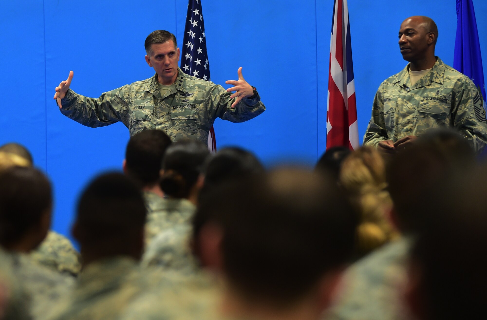 Lt. Gen. Timothy Ray, the 3rd Air Force and 17th Expeditionary Air Force commander and Chief Master Sgt. Kaleth Wright, the 3rd Air Force and 17th Expeditionary Air Force command chief, speak to Airmen during an all-call at RAF Croughton, United Kingdom, Nov. 10, 2015. During the event, Ray spoke about how Airmen should be proud of their service and their accomplishments in the Air Force. The senior leaders received firsthand knowledge of the 501st Combat Support Wing’s mission and met and interacted with Airmen. (U.S. Air Force photo by Master Sgt. Chrissy Best/Released)