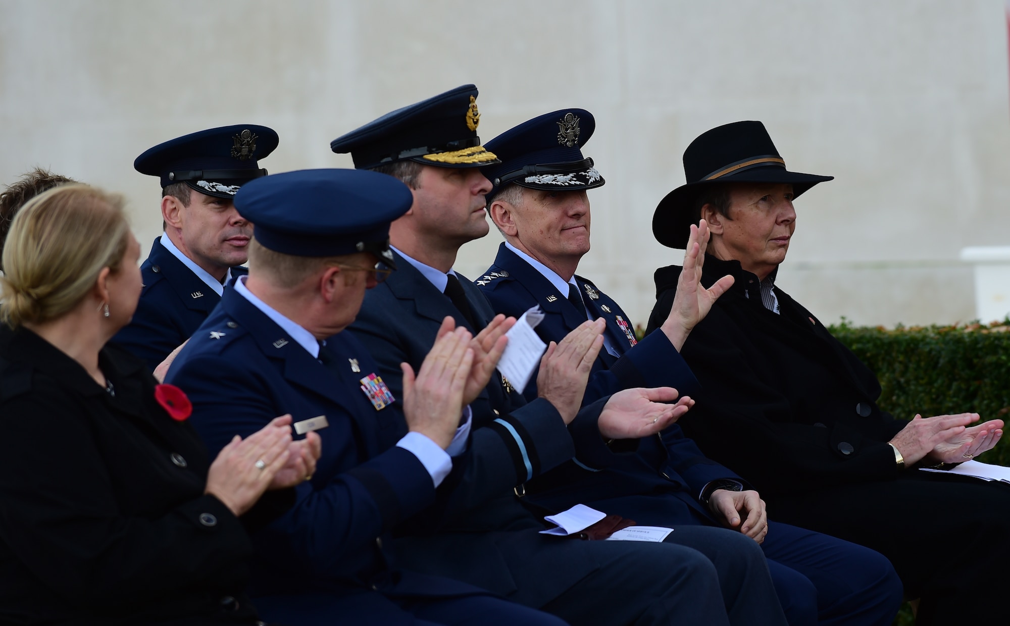 U.S. Air Force Lt. Gen. Timothy Ray, the 3rd Air Force and 17th Expeditionary Air Force commander, waves to the audience, during the Veterans Day ceremony at Cambridge American Cemetery, United Kingdom, Nov. 11, 2015. Ray joined American and Royal Air Force Service members, along with civilians and local leaders, to honor the dedication and sacrifices of veterans throughout history. (U.S. Air Force photo by Master Sgt. Chrissy Best/Released)