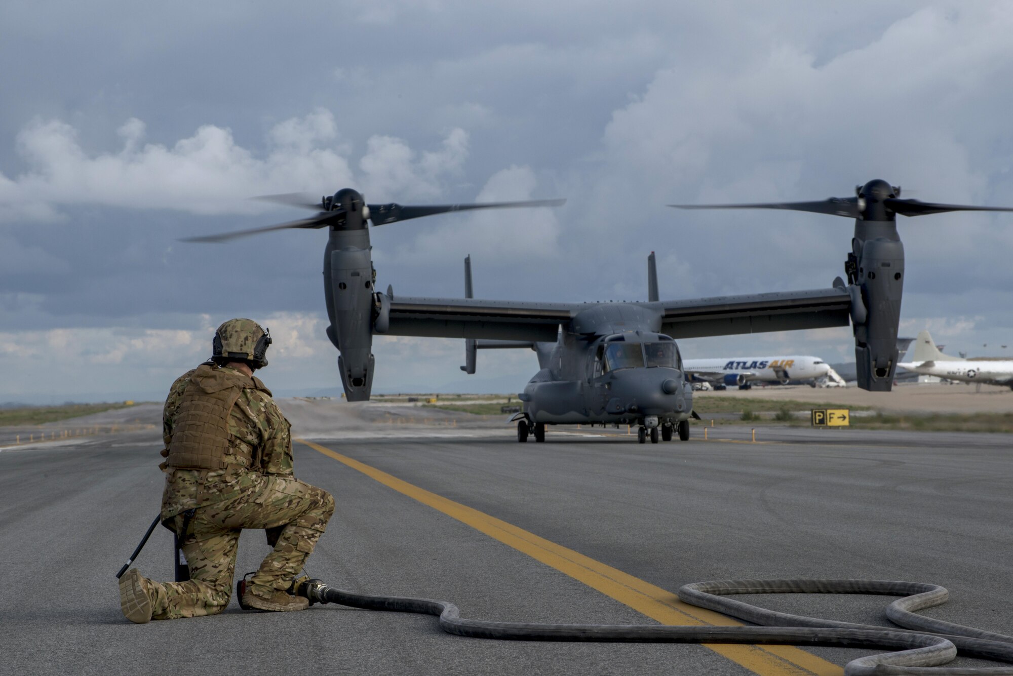 MC-130J Commando II crews and maintainers from the 352d Special Operation Wing refuel a CV-22 Osprey during a Forward Arming and Refueling Point on the flightline at Naval Air Station Rota, Spain, Nov. 4, 2015.  The MC-130J is capable of flying clandestine missions, low-level air refueling for special operations helicopters and tilt-rotor aircraft, exfiltration, infiltration, and resupply of special operations forces by airdrop or airland. (U.S. Air Force photo by 1st Lt. Chris Sullivan/Released)