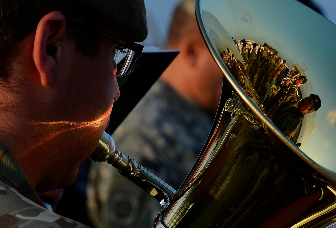 Members of the British army band play during a Remembrance Day service near Camp Lemonnier, Djibouti, Nov. 11, 2015. U.S. Air Force photo by Tech. Sgt. Dan DeCook