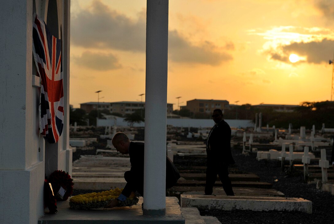 Thomas R. Kelly III, U.S. ambassador to Djibouti, lays a wreath during a Remembrance Day service near Camp Lemonnier, Djibouti, Nov. 11, 2015. Remembrance Day honors veterans and the millions of people who were killed during the world wars and other conflicts. U.S. Air Force photo by Tech. Sgt. Dan DeCook