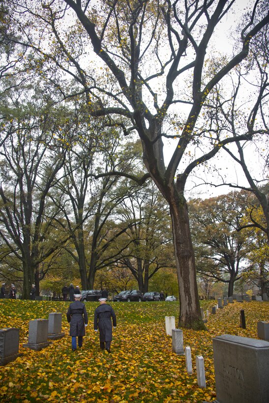 Commandant of the Marine Corps, Gen. Robert B. Neller, and Col. Benjamin Watson, commanding officer, Marine Barracks Washington, D.C., walk through the Arlington National Cemetary, Va., Nov. 10, 2015. Neller laid a wreath in honor of Gen. Lemuel Cornick Shepherd Jr., the 20th Commandant of the Marine Corps. (U.S. Marine Corps photo by Staff Sgt. Gabriela Garcia/Released)
