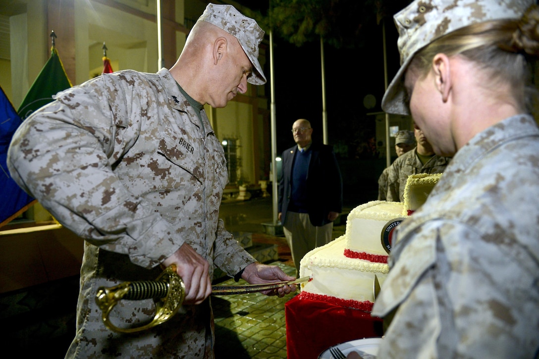U.S. Marine Corps Maj. Gen. Paul W. Brier, left, cuts a Marine Corps birthday cake during a cake-cutting ceremony celebrating the U.S. Marine Corps’ 240th birthday on Camp Resolute Support in Kabul, Afghanistan, Nov. 9, 2015. U.S. Air Force photo 