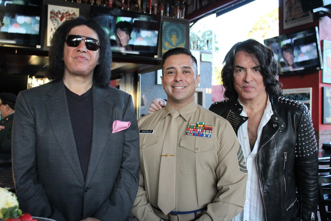 Gunnery Sgt. Roberto Castillo, Recruiting Station Los Angeles Military Entrance Processing Station liasion, poses for a photo with Rock and Roll Hall of Famers Gene Simmons and Paul Stanley of KISS, Nov. 11, 2015, for a Veterans Day tribute at the Rock and Brews in El Segundo, Calif. The event was televised on KTLA Morning News. (U.S. Marine Corps photo by Sgt. Alicia R. Leaders/Released) 