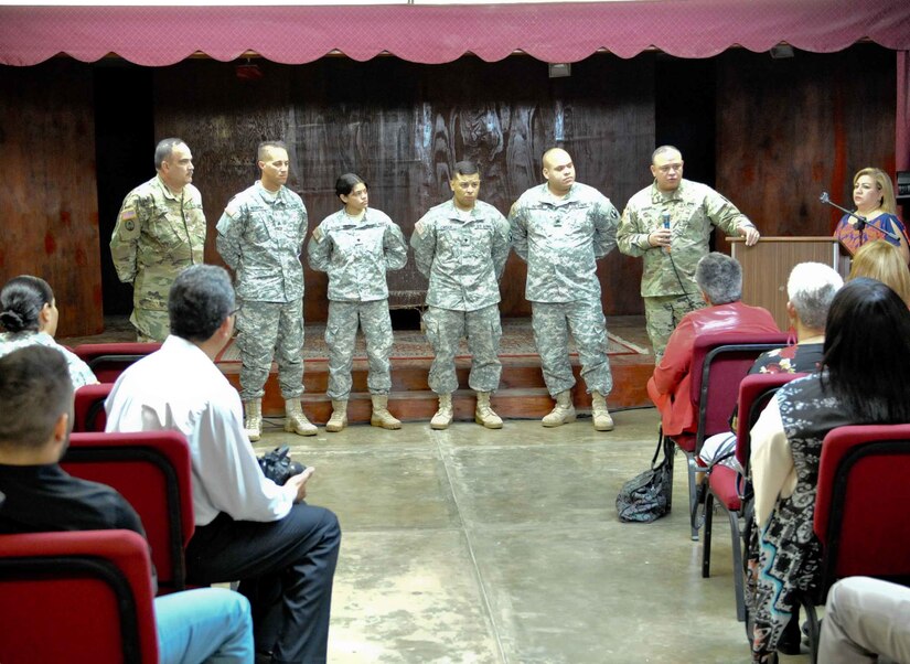 Brig. Gen. Jose Burgos recognizes and thanks Soldiers from the 448th Engineer Battalion for their support in rebuilding the theater stage as part of a community engagement project at the Manuela Toro High School theater stage re-inauguration on Nov. 6.