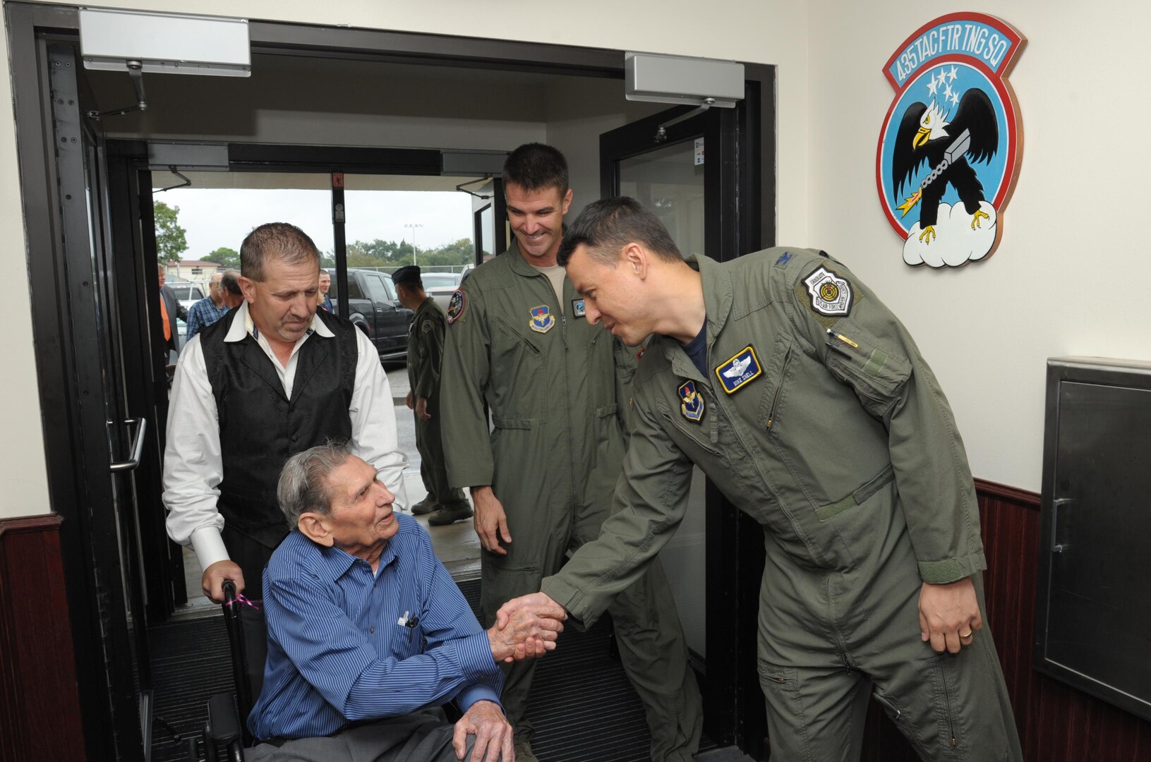 Col. Michael Snell (right), 12th Flying Training Wing vice commander, greets retired Lt. Col. Thomas "Tommy" H. Temple during a tour of the 435th Fighter Training Squadron Oct. 30 at Joint Base San Antonio-Randolph.
