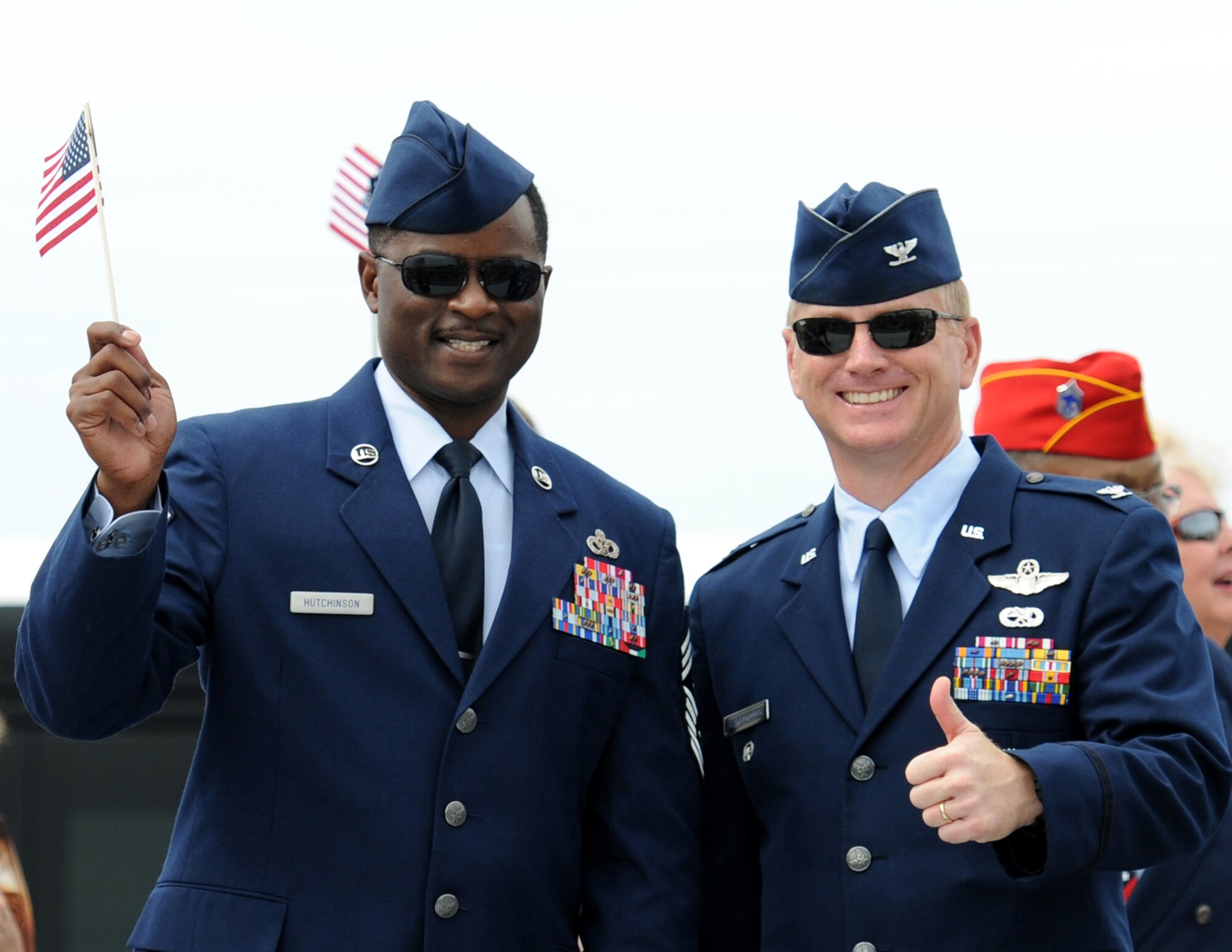 Chief Master Sgt. Harry Hutchinson, 81st Training Wing command chief, and Col. Dennis Scarborough, 81st TRW vice commander, Keesler Air Force Base, Miss., pose for a photo during the 15th Annual Gulf Coast Veterans Day Parade Nov. 7, 2015, in Gulfport, Miss. Keesler’s 81st Training Wing leadership, Honor Guard, 81st Training Group’s Drum and Bugle Corps, and Airmen participated in the event. (U.S. Air Force photo by Kemberly Groue)