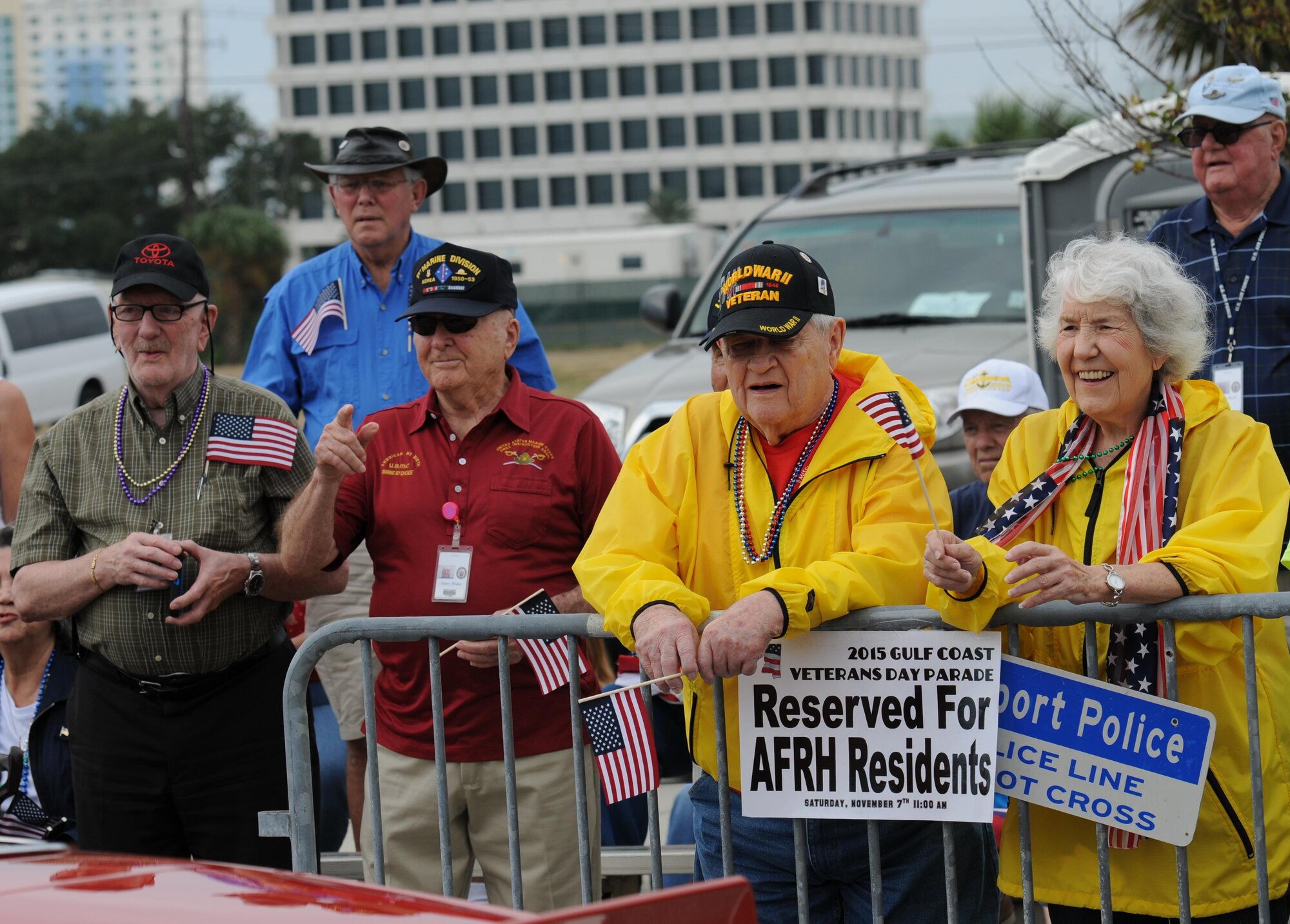 Armed Forces Retirement Home residents watch parade participants during the 15th Annual Gulf Coast Veterans Day Parade Nov. 7, 2015, in Gulfport, Miss. Keesler’s 81st Training Wing leadership, Honor Guard, 81st Training Group’s Drum and Bugle Corps, and Airmen participated in the event. (U.S. Air Force photo by Kemberly Groue)