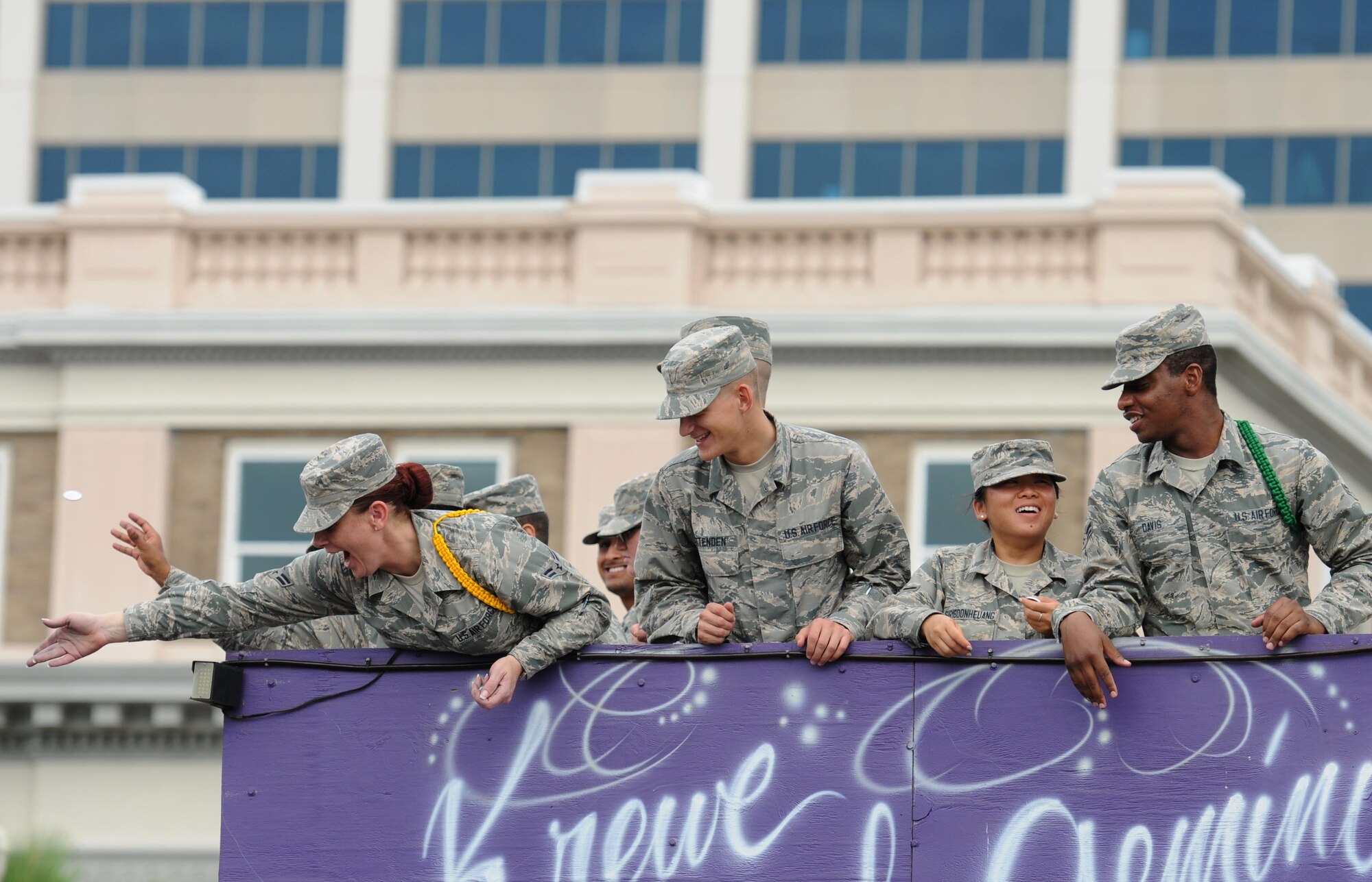 Airmen from the 81st Training Group, Keesler Air Force Base, Miss., ride on a float during the 15th Annual Gulf Coast Veterans Day Parade Nov. 7, 2015, in Gulfport, Miss. Keesler’s 81st Training Wing leadership, Honor Guard, and 81st Training Group’s Drum and Bugle Corps participated in the event. (U.S. Air Force photo by Kemberly Groue)