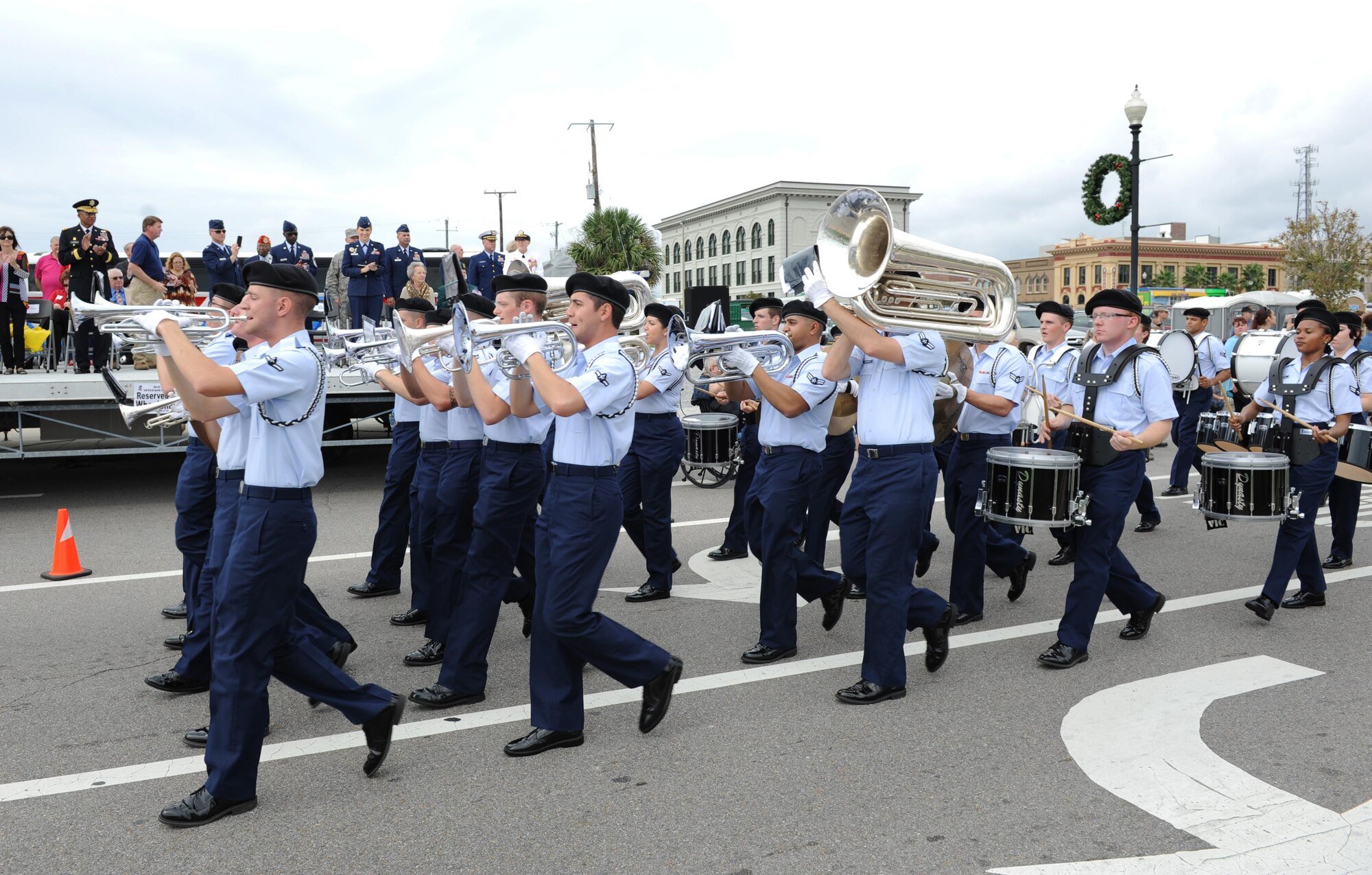 The 81st Training Group’s Drum and Bugle Corps, Keesler Air Force Base, Miss., march in the 15th Annual Gulf Coast Veterans Day Parade Nov. 7, 2015, Gulfport, Miss. Keesler’s Wing leadership, Honor Guard and Airmen, who carried the 50 state flags, also participated in the event. (U.S. Air Force photo by Kemberly Groue)