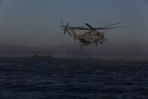Marines with Company A, 1st Reconnaissance Battalion, 1st Marine Division, insert into the ocean from a CH-53E Super Stallion with Marine Heavy Helicopter Squadron-465, during helocast training off the coast of Marine Corps Base Camp Pendleton, Calif., Nov. 6, 2015. Helocasting allows Marines to swiftly and stealthily insert from a helicopter into any body of water in order to then utilize Combat Rubber Raiding Craft to conduct amphibious beach reconnaissance and raids. (Official Marine Corps photo by Cpl. Will Perkins)