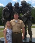 Clarence and his wife, Ashley Enlow, when he was active duty in the Marine Corps.